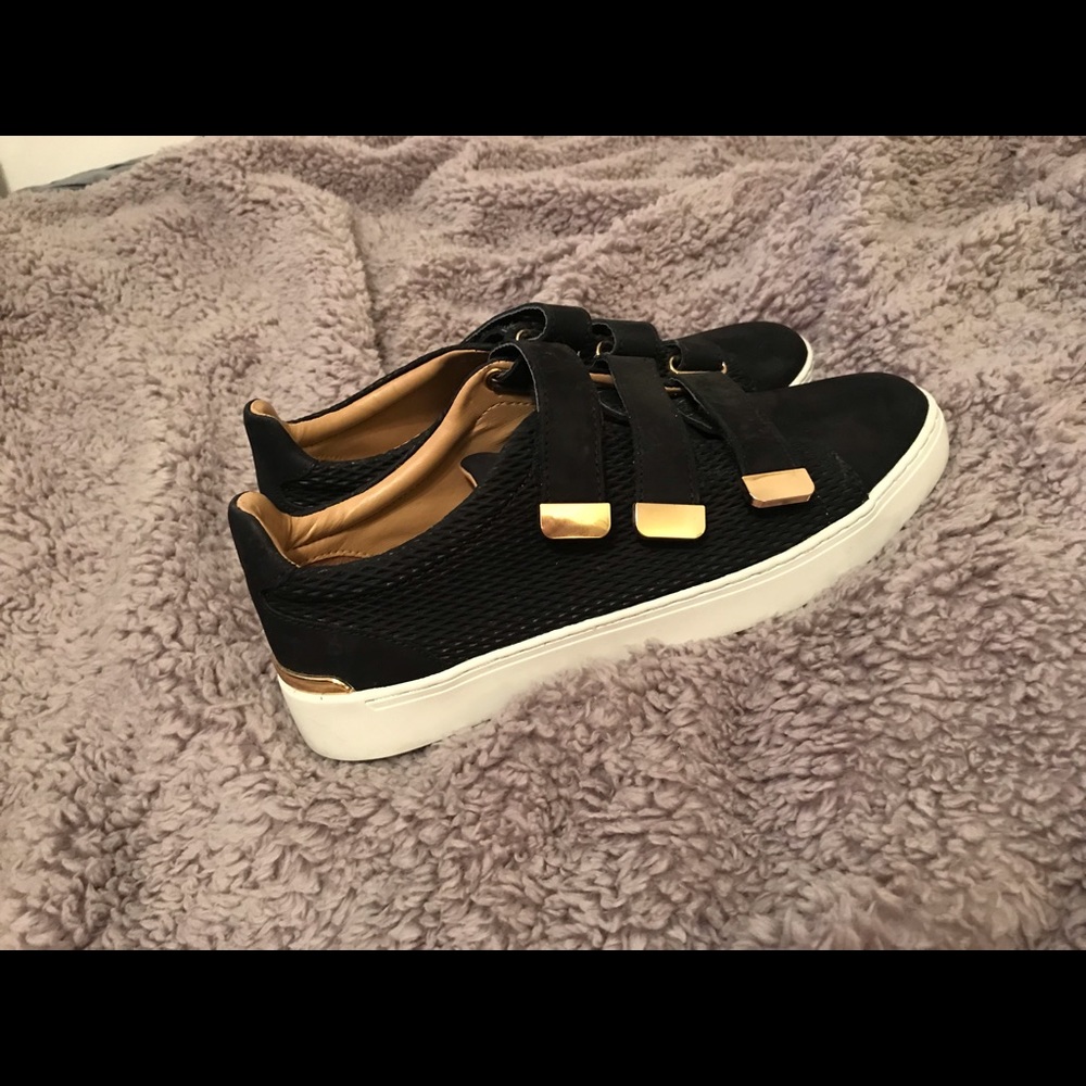 Black and Gold sneakers from Aldo
